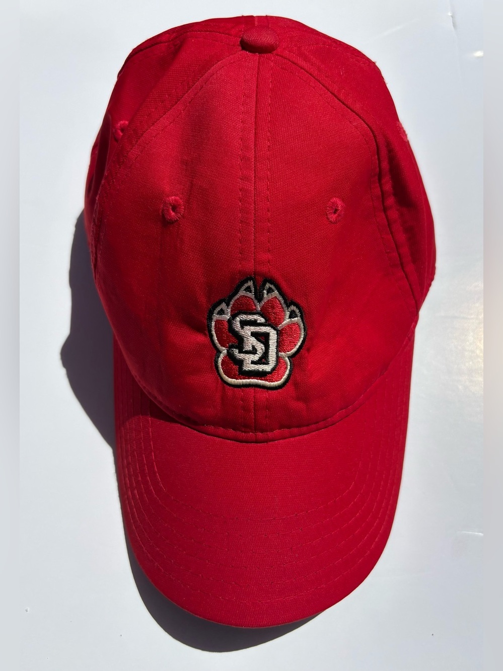 South Dakota Coyotes NCAA baseball cap by Adidas.